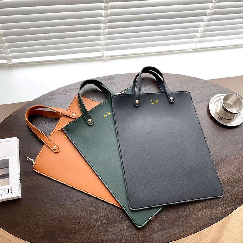 Borsa per Laptop di Design Lus - Leatherwork Letters recensione e prezzo